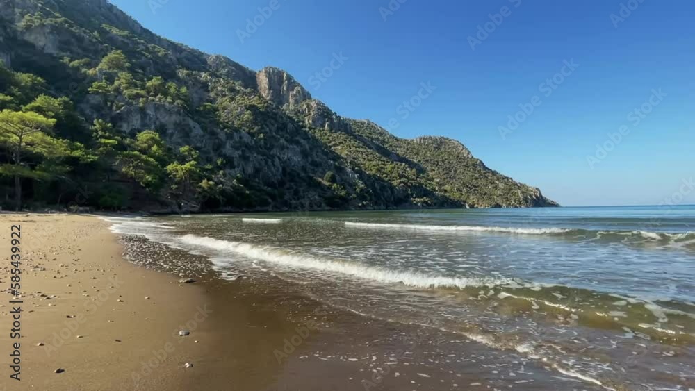 waves on the beach in a lonely bay in Turkey waves on the beach in a lonely bay in Turkey