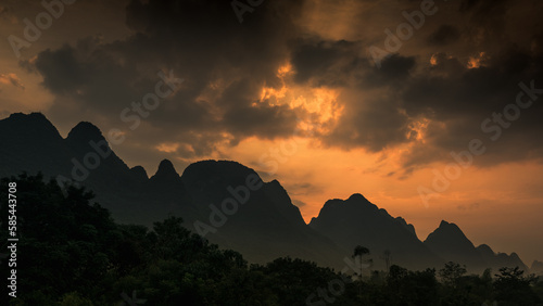 Beautiful sunset over limestone peaks near Yalong River  Yangshuo  China