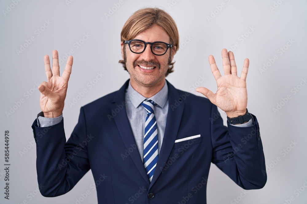 Caucasian man with mustache wearing business clothes showing and pointing up with fingers number eight while smiling confident and happy.
