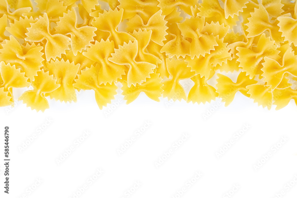 Fototapeta premium Farfalle spaghetti pattern, food background. Scattered raw pasta isolated on white background, ingredient for cook, traditonal italian cuisine. Banner, header, backdrop for restaurant menu