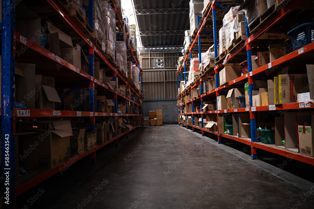 Warehouse or storage and shelves with cardboard boxes.