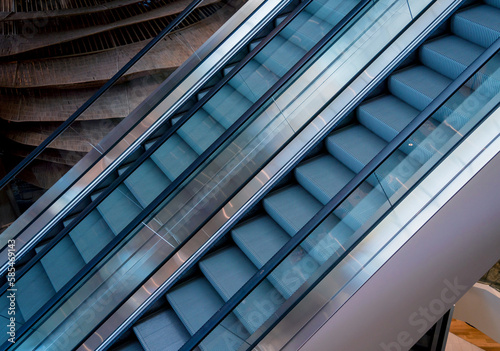 Modern automatic escalator system in shopping mall