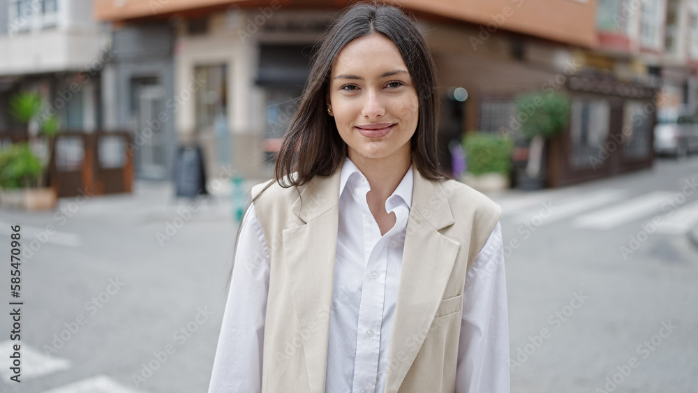 Young beautiful hispanic woman smiling confident standing at street Young beautiful hispanic woman smiling confident standing at street