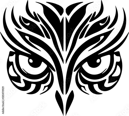 ﻿A Black and White Owl Tattoo with Polynesian Designs.