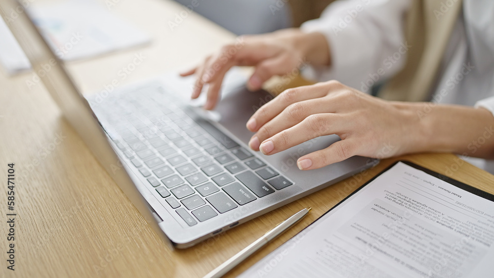 Young beautiful hispanic woman using laptop at office Young beautiful hispanic woman using laptop at office