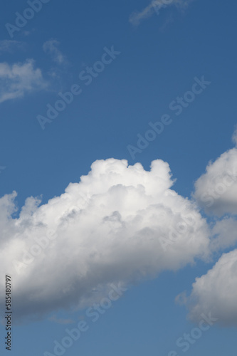 Background with white clouds on blue sky at daytime 