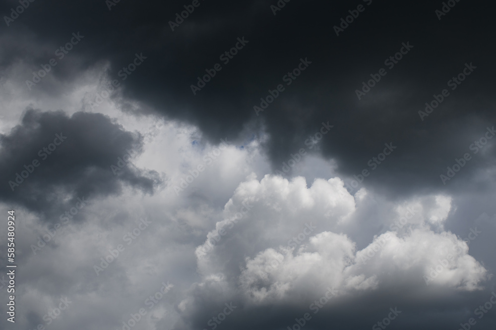 Natural background with dramatic and rainy grey clouds on sky