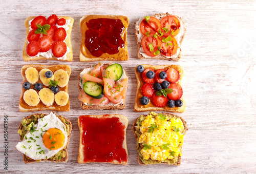 Selection of breakfast toasts with different toppings - savory and sweet.