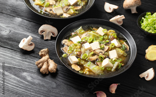 Cabbage Tofu Soup with mushrooms and spring onion.