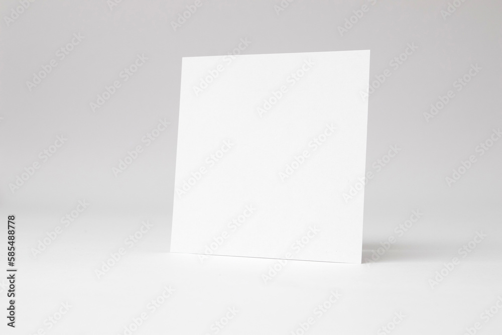 Fototapeta premium A blank square white paper on white background