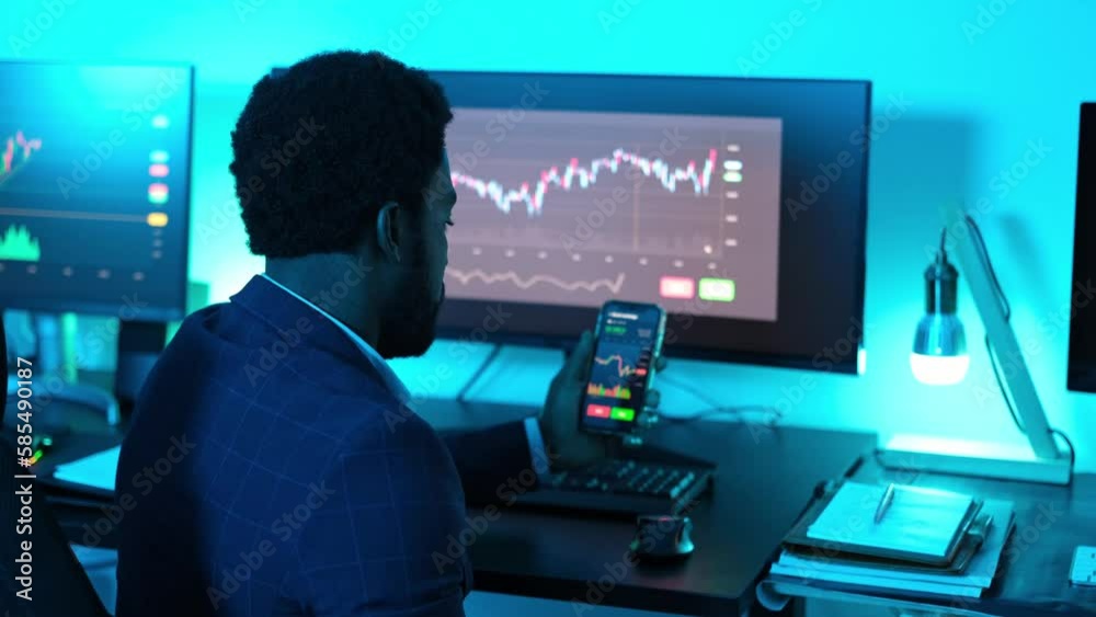 4k video of young man using his smartphone to invest in the internet and study the market. Concept: investment, business, growth 4k video of young man using his smartphone to invest in the internet and study the market. Concept: investment, business, growth