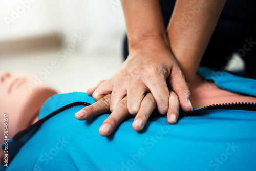 CPR Training ,Emergency and first aid class on cpr doll, Cardiopulmonary resuscitation, One part of the process resuscitation on unconscious person.