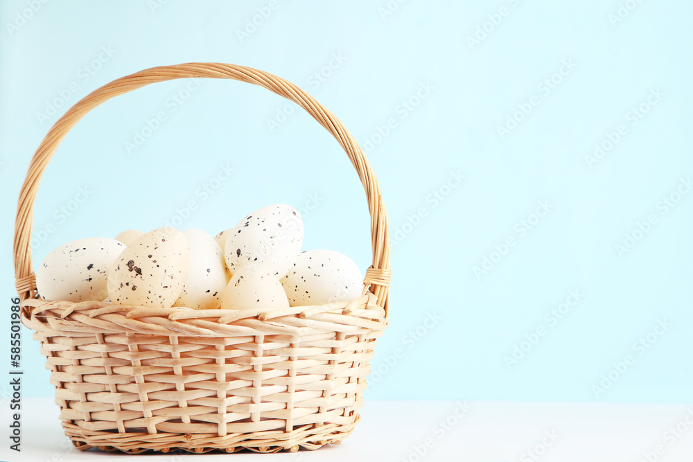 Eggs in basket on blue background Eggs in basket on blue background
