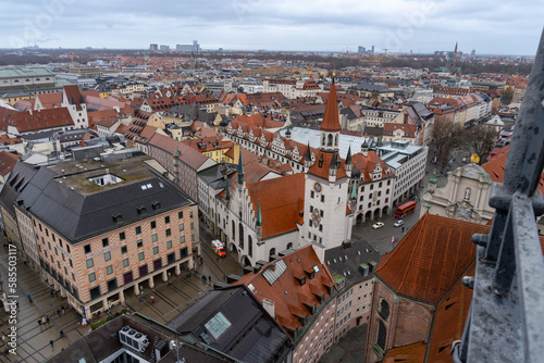 View from the bell tower of the church of st. Peter of the city of Munich on a cloudy and rainy day.