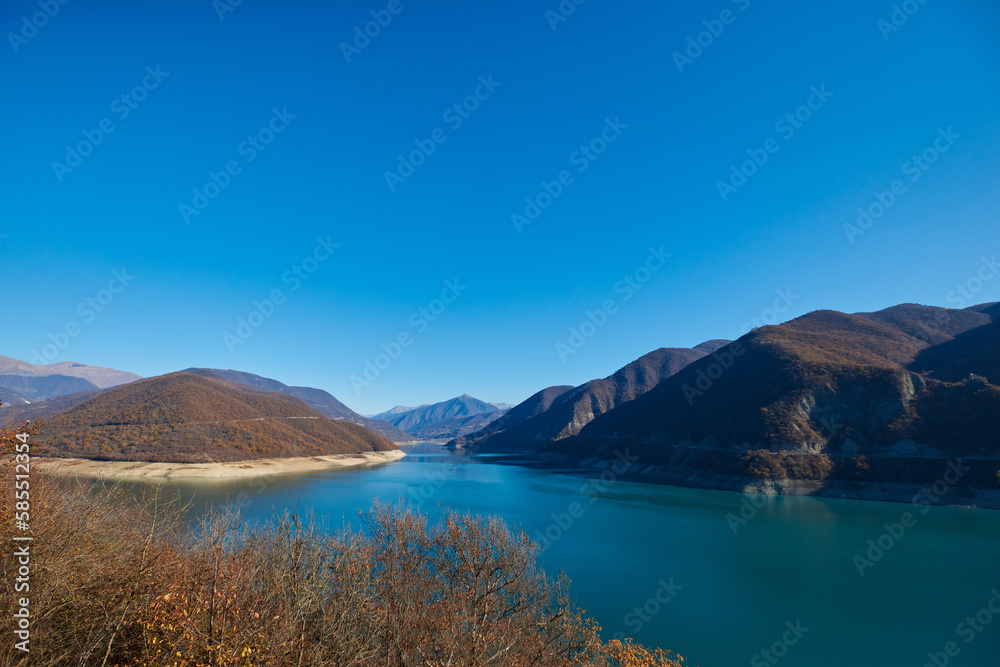 a beautiful view of the lake with turquoise water and a beautiful mountain landscape. autumn landscape