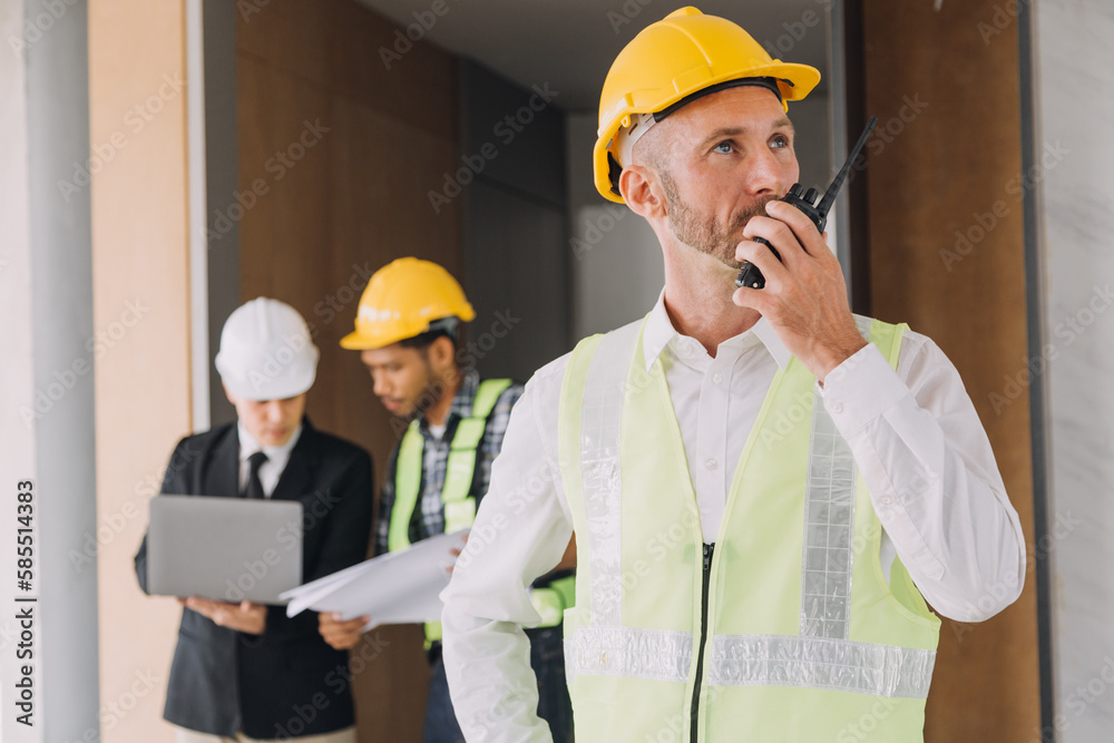 Diverse Team of Specialists Use Tablet Computer on Construction Site. Real Estate Building Project with Civil Engineer, Architect, Business Investor and General Worker Discussing Plan Details. Diverse Team of Specialists Use Tablet Computer on Construction Site. Real Estate Building Project with Civil Engineer, Architect, Business Investor and General Worker Discussing Plan Details.