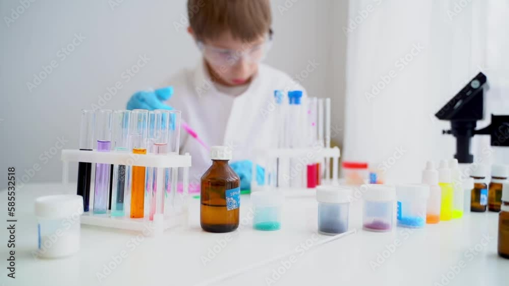 a student conducts chemical experiments in a chemical laboratory a student conducts chemical experiments in a chemical laboratory