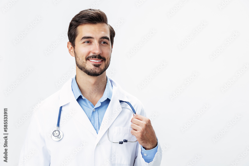 Man doctor in a white coat with a stethoscope smile with teeth and good test results looking into the camera on a white isolated background, copy space, space for text, health Man doctor in a white coat with a stethoscope smile with teeth and good test results looking into the camera on a white isolated background, copy space, space for text, health