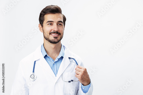 Man doctor in a white coat with a stethoscope smile with teeth and good test results looking into the camera on a white isolated background  copy space  space for text  health