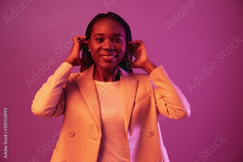 Woman african american business smile with teeth, colored pink color, bright coloring.