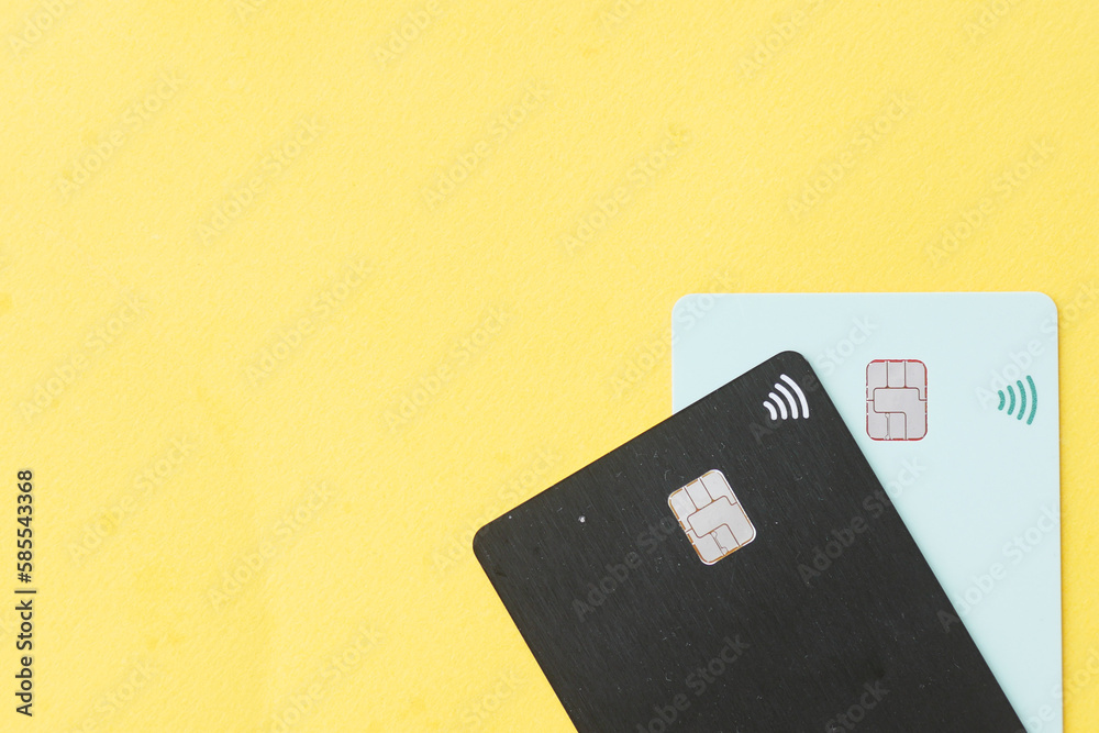 wireless bank card on yellow background wireless bank card on yellow background