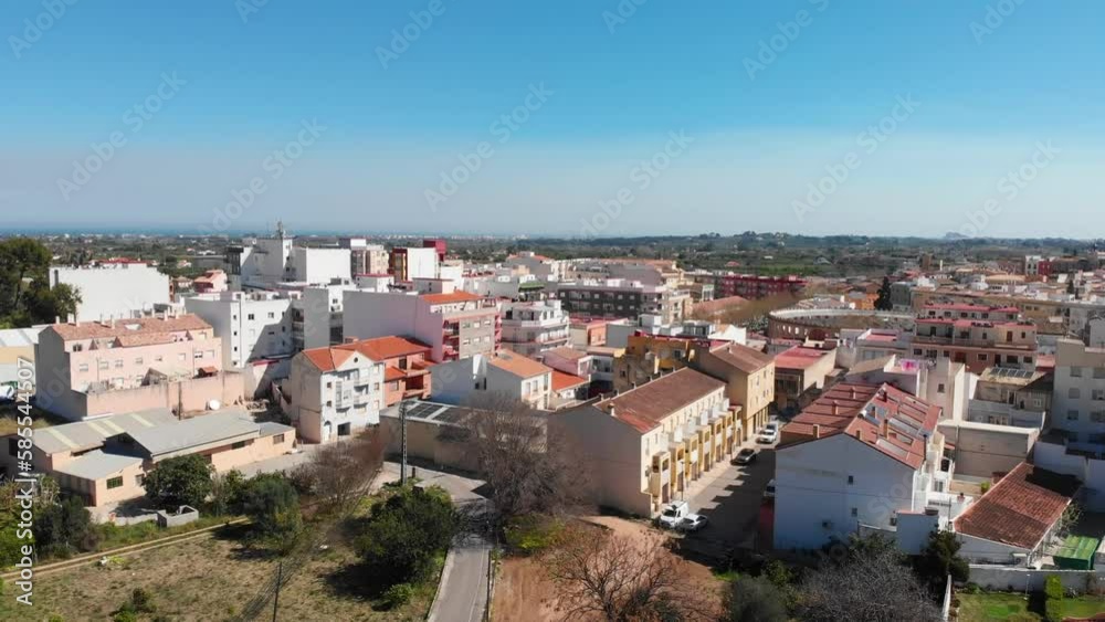 Aerial view of Ondara village in Alicante, Spain. Montgó mountain and Mediterranean Sea are in the background. Aerial view of Ondara village in Alicante, Spain. Montgó mountain and Mediterranean Sea are in the background.