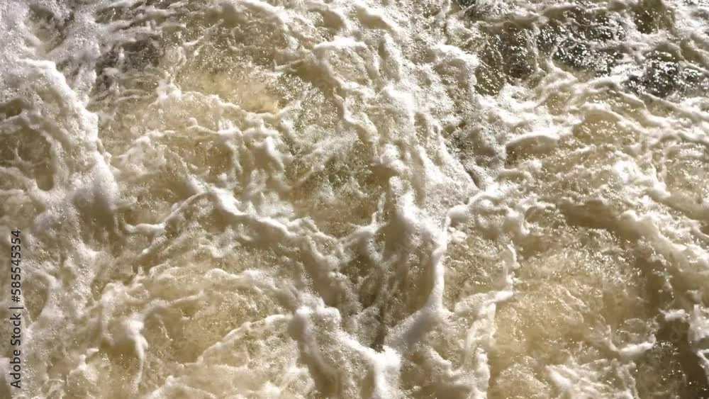 Stream of bubbling water with a light-colored background 4k Stream of bubbling water with a light-colored background 4k