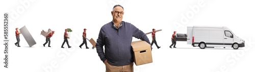 Movers loading a van with household items and a mature male customer holding a box