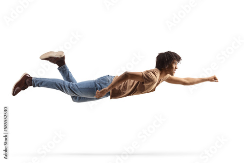 African american guy flying with arm forward