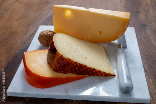 Cheese collection, tasty Belgian abbey cheeses made with brown trappist beer photo