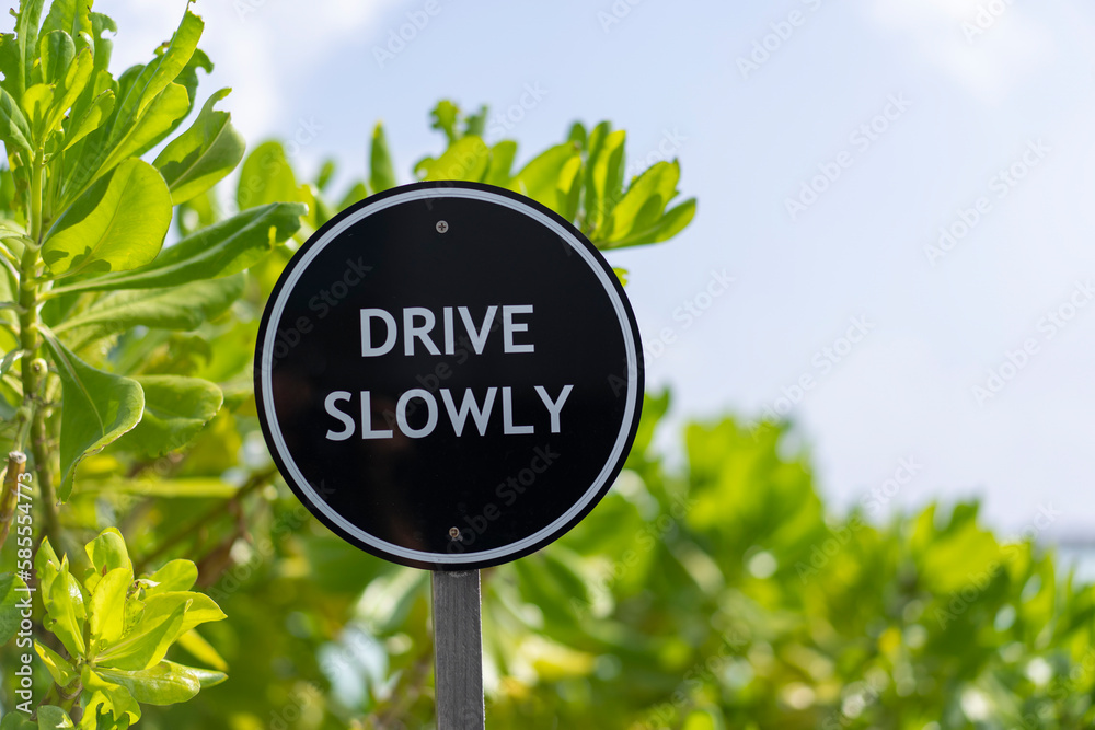 Sign Drive Slowly on a bridge at resort in the Maldives