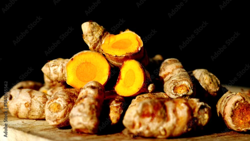 detail shot of turmeric root in bowl on table , detail shot of turmeric root in bowl on table ,