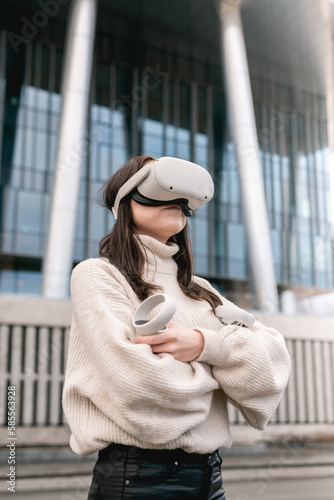 Girl using VR headset in the city