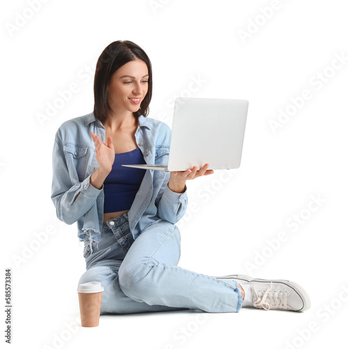 Pretty young woman with lap...