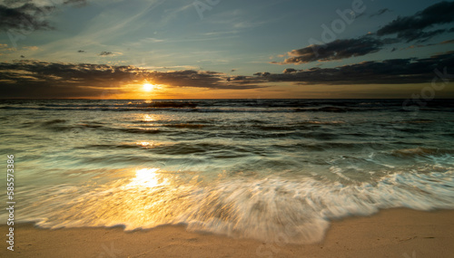 Sunset by the sea. Nature and nature landscape at sunset.