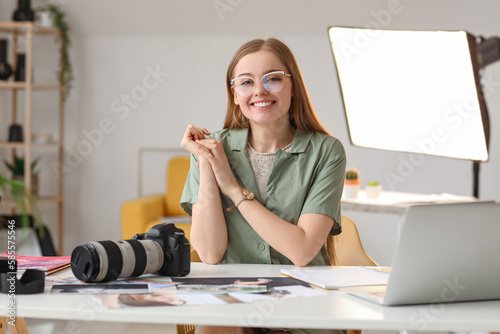 Young female photographer a...