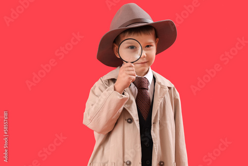 Cute little detective with ...