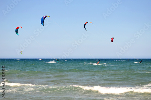 Beach with kite surfing activities