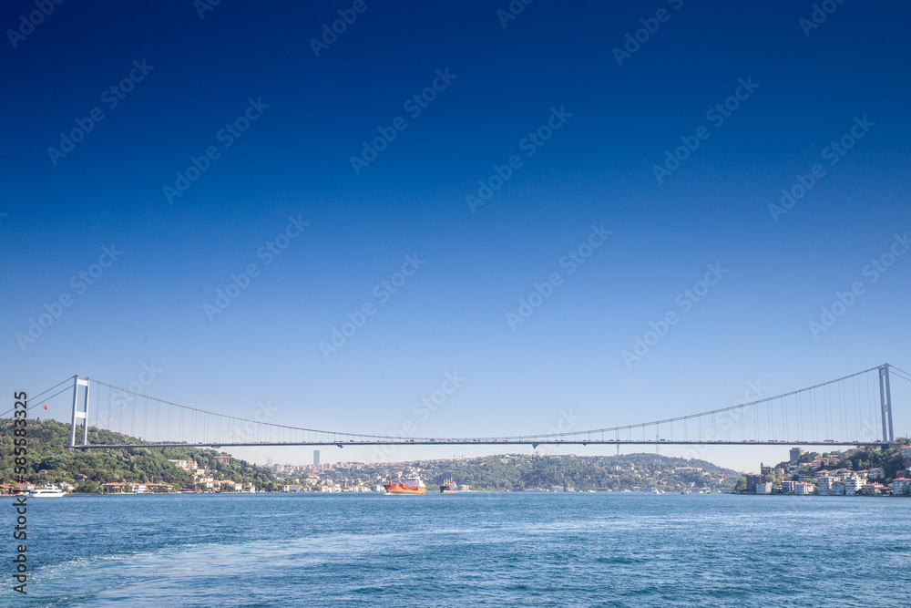 Panorama of the bosphorus strait and the second Bosphorus Bridge; also called faith sultan mehmet koprusu bridge , seen from below. it's a bridge in Istanbul connecting Asian and European side.