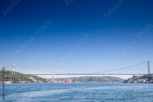 Fototapeta Naklejka Na Ścianę i Meble -  Panorama of the bosphorus strait and the second Bosphorus Bridge; also called faith sultan mehmet koprusu bridge , seen from below. it's a bridge in Istanbul connecting Asian and European side.