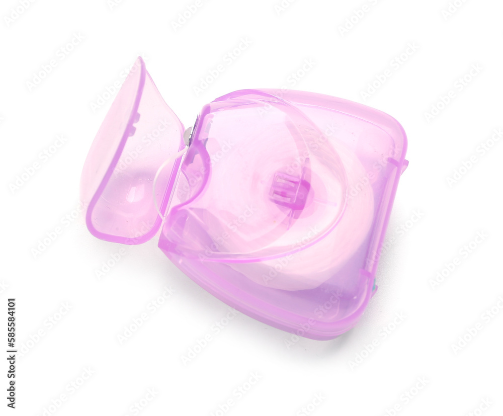 Case with pink dental floss isolated on white background Case with pink dental floss isolated on white background