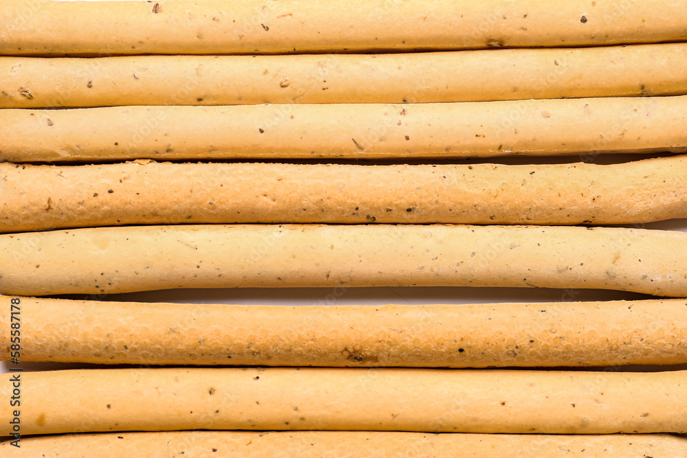 Tasty Italian Grissini as background, closeup Tasty Italian Grissini as background, closeup