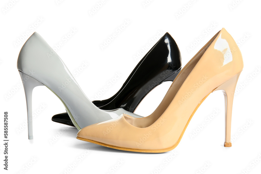 Stylish high heeled shoes on white background Stylish high heeled shoes on white background