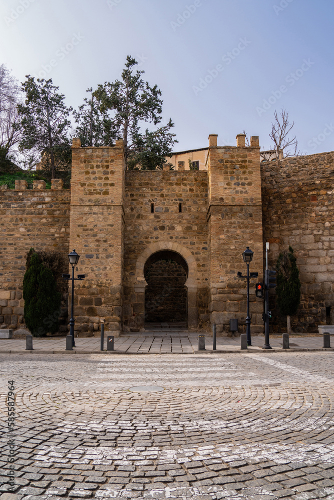 Beautiful stone arch gateway to the city of Toledo Spain