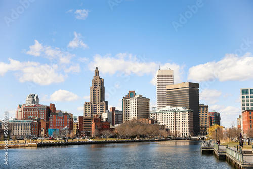 A view of Providence, Rhode Island showcasing a modern cityscape with towering skyscrapers, bustling streets and a thriving urban environment. A perfect representation of the modern metropolis. © Your Hand Please
