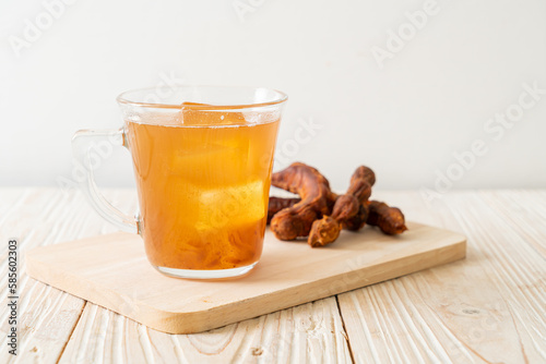 Delicious sweet drink tamarind juice and ice cube