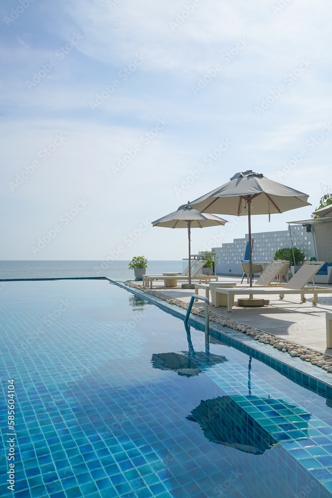 Fototapeta premium bed pool around swimming pool with sea background