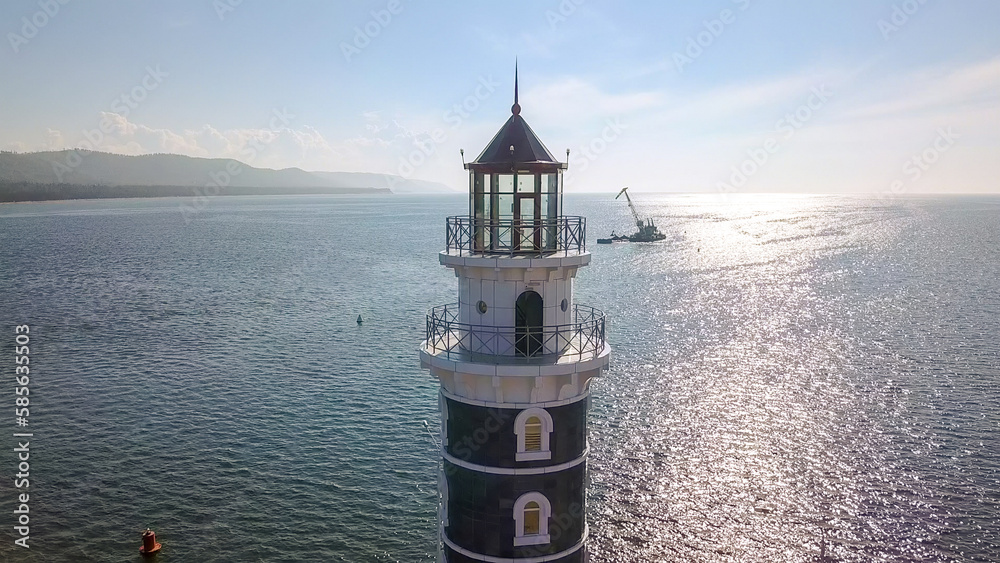 Russia, Lake Baikal. The lighthouse on the shore of the lake. Mouth of the river Turk, From Drone