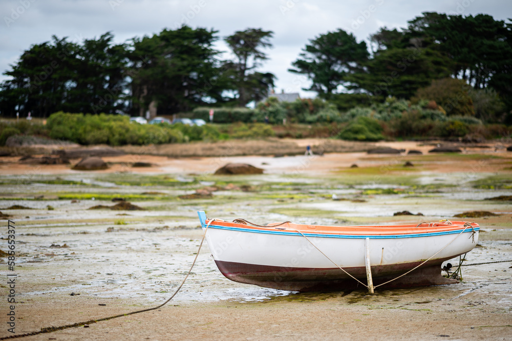 A stranded boat near the sea in summer A stranded boat near the sea in summer