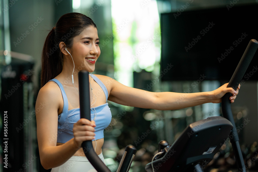 Fototapeta premium Workout gym sport asia women, asian woman at sport club fitness training, lifestyle women gym sport fitness.